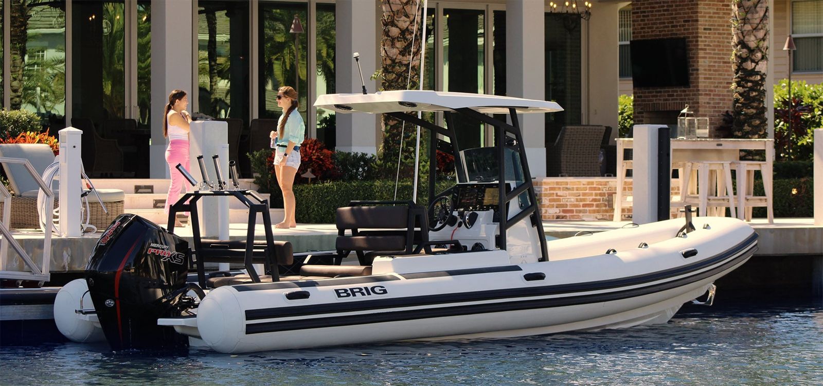 BRIG Navigator 24 cruising at the dock with family aboard